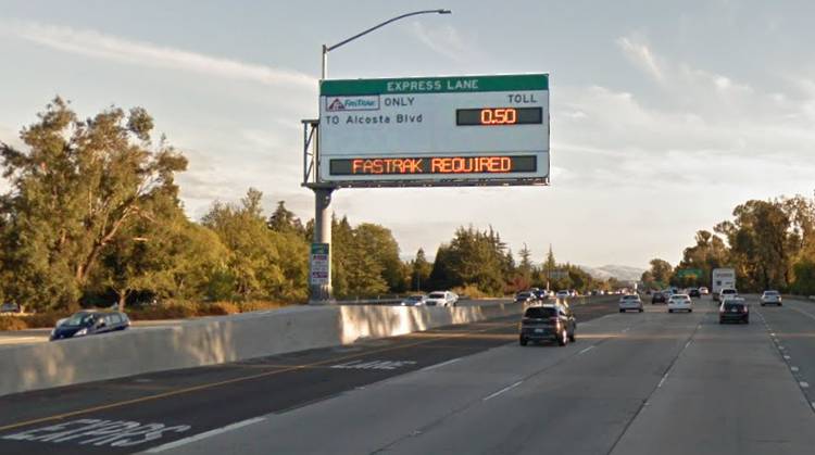 What is a HOT lane/HOT Lane definition: HOT lane with variable pricing on highway