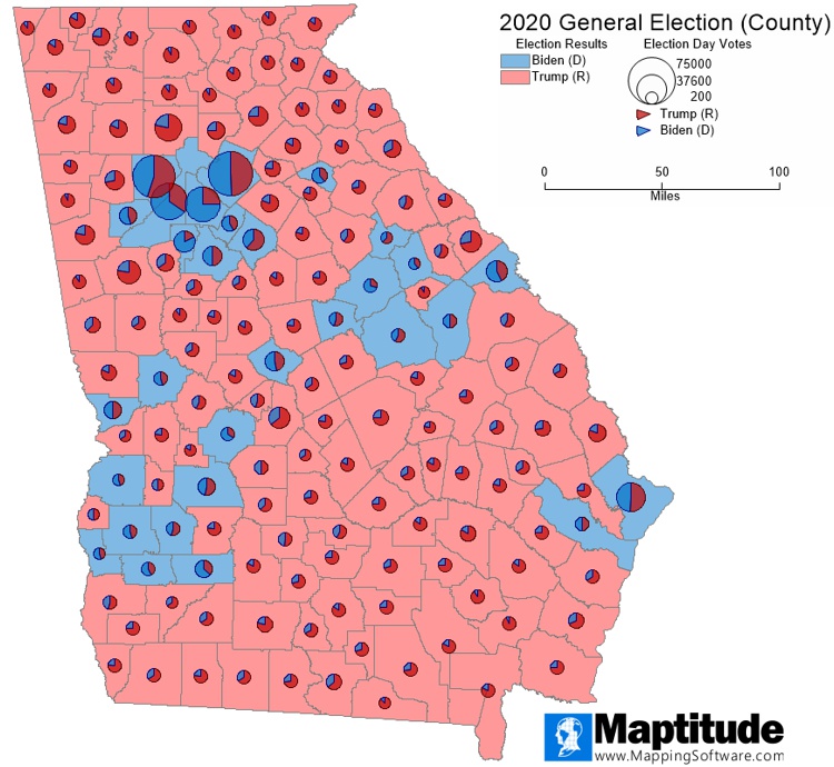 Map of Georgia with counties that Trump won in red and counties that Biden won in blue. Pie charts on each county show the breakdown of election-day votes. Large pies indicate more election-day votes and are in the more urban counties.