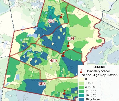 A school district plan for a town with four schools and each district is labeled with the population as calculated by map software for local government