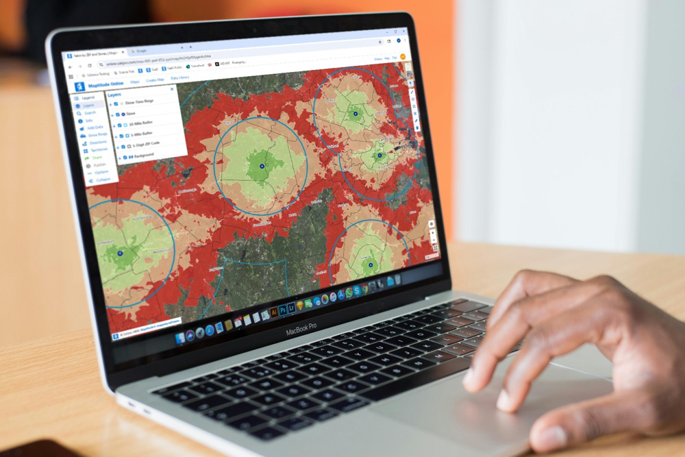 Maptitude Online drive-time and distance ring analysis around store locations on a MacBook